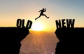 Man jumping over abyss with text OLD/NEW. Royalty Free Stock Photo