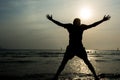 A man jumping at the sea. Royalty Free Stock Photo