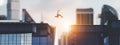 Man jumping between skyscrapers. Business success