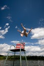 Man jumping in to a lake Royalty Free Stock Photo