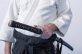 A man with katana on Iaido practice