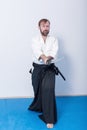 A man with katana on Iaido practice