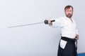 A man with katana on Iaido practice