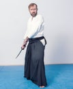 A man with katana is ready to attack