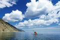 The man in a kayak goes across Lake Baikal Royalty Free Stock Photo