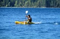 Man in kayak in a lake Royalty Free Stock Photo