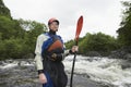 Man With Kayak Oar Against River Royalty Free Stock Photo