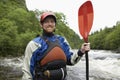 Man With Kayak Oar Against River Royalty Free Stock Photo