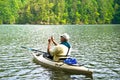 Man In Kayak Stopping To Take Photo