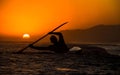 Man in kayak on the sea at beautiful sunset Royalty Free Stock Photo