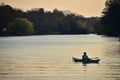 Man kayaking at sunset in Wannsee lake in Wannsee Berlin Germany