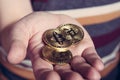 Man is keeping bitcoin cryptocurency gold coin in his hand Royalty Free Stock Photo