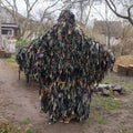 Man in a kikimora camouflage net. Russian-Ukrainian war