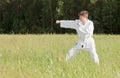 Man in kimono engaged oriental combat sports