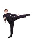 Man in a kimono practicing kung fu with nunchaku