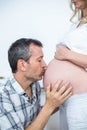 Man kissing the belly of pregnant woman Royalty Free Stock Photo