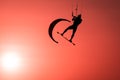 Man kiteboarder silhouette kiteboarder jumping sport at sunset golden hour, kite surfing athlete kiteboarding jump at kite surf Royalty Free Stock Photo