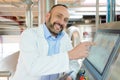 man in lab coat in factory Royalty Free Stock Photo