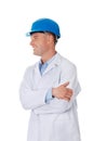 Man in a lab coat and helmet Royalty Free Stock Photo