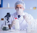 Man in the lab testing new cleaning solution detergent Royalty Free Stock Photo