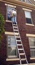 Man on Ladder Royalty Free Stock Photo