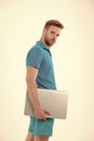 Man with laptop in blue sport clothes. Sportsman with computer for internet game. Sport bets and gambling online. New