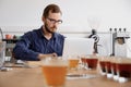 Man with laptop at coffee shop