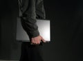 Man with laptop in his hand