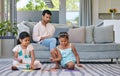 Man, laptop and kids on floor with family for online research, remote work or freelance website. Dad, children and Royalty Free Stock Photo