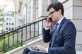 Man on laptop and phone Royalty Free Stock Photo