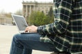 Man with laptop works outdoor. Free work Royalty Free Stock Photo