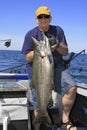 Man with Large Fish - Lake Ontario King Salmon Royalty Free Stock Photo