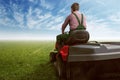 Man on a lawn tractor