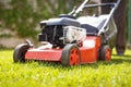 Man with lawnmower Royalty Free Stock Photo