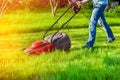 Man with lawnmower Royalty Free Stock Photo