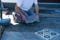 Man laying floor tiles Royalty Free Stock Photo