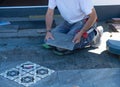 Man laying floor tiles Royalty Free Stock Photo