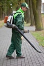 Man with leaf blower Royalty Free Stock Photo