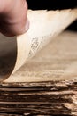Man leafing through a thick old book Royalty Free Stock Photo