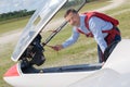 Man leaning over cab glider Royalty Free Stock Photo
