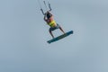 Man learning basic jumps kitesurfing, boy jumping at kiteboarding school. Kite surf lessons in the Canary islands, Fuerteventura