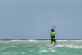 Man learning kitesurfing, men at kiteboarding school. Kite surf lessons in the Canary islands, Fuerteventura. boy doing the water