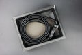 Man leather belt in black in a box on dark background Royalty Free Stock Photo