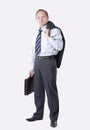 Man with a leather briefcase holding a jacket over his shoulde. isolated on white background. Royalty Free Stock Photo