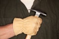 Man with Leather Construction Glove Holding Hammer Royalty Free Stock Photo