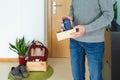 Man leaving things in boxes when he gets home to prevent covid infection19. Concept COVID-19. Coronavirus Royalty Free Stock Photo