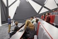 Man lectures students in lecture theatre, front row seat POV Royalty Free Stock Photo