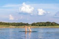 Man legs sticking out from water. Starting swimming season. Funny photo. Enjoying vacation. Bad jump. Reach the bottom