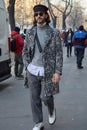 Man with leopard skin pattern coat in black and white before Fendi fashion show, Milan Fashion