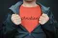 A man with the letters christian on his red t-shirt Royalty Free Stock Photo